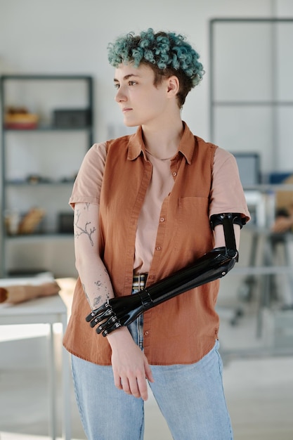 A patient fitted with a 3D printed prosthetic limb or implant, showcasing the personalized fit and functionality. The image highlights the comfort and ease of use of the 3D printed medical device, improving the patient's quality of life.