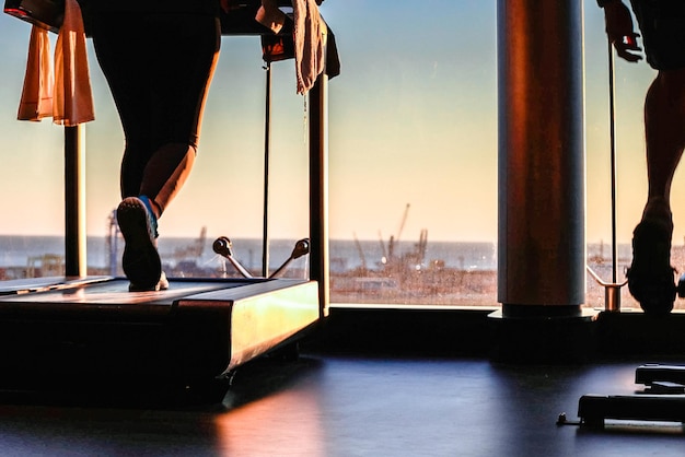 Inside a modern and state-of-the-art gaming studio in Barcelona, Spain. The studio is equipped with high-end computers, VR development kits, and motion capture systems. A team of diverse game developers, including programmers, artists, and designers, are collaborating around large monitors, discussing and testing various aspects of a game. The atmosphere is creative and focused, with whiteboards filled with concepts and designs.