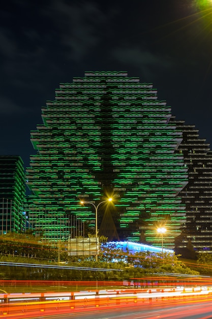 A futuristic representation of Madrid, Spain, with holographic displays showing data analytics and smart grid management systems. The image emphasizes cybersecurity measures with digital locks and encryption symbols overlaying the cityscape.