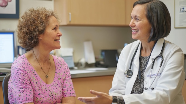 A doctor talking with a patient, both smiling, illustrating the doctor-patient relationship in healthcare.