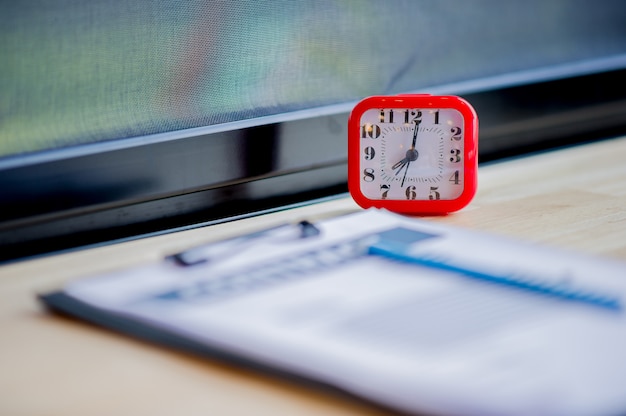 A calendar marked with deadlines and a clock, symbolizing the importance of adhering to timelines when appealing a denied social benefit. The background is a subtle, blurred image of legal documents.