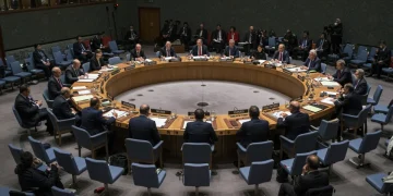 Diplomats at UN Security Council meeting discussing resolutions